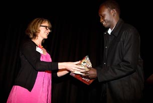Miranda Harcourt, patron, Arts Access Aotearoa presented the Big 'A' Winton and Margaret Bear Young Artist Award 2011 to Makuei Aken